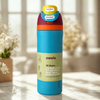A 32 oz Owala water bottle with a bright blue body, orange and purple accents, and a yellow lid, standing on a marble surface with a blurred indoor background.