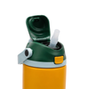 Close-up of a reusable bottle lid with a dark green flip-up spout, a translucent straw, a light gray carrying loop, and a yellow-orange body on a white background.