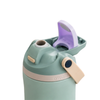 A close-up of a water bottle lid in a muted sage green color, featuring a lavender flip-top spout and a beige carrying loop, with the 'owala' brand name embossed on a beige band.